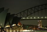 The global event began as the Sydney Opera House and Harbour Bridge plunged into darkness.