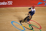 Riding rings around them ... Sir Chris Hoy set new world records in the first round and gold medal race.