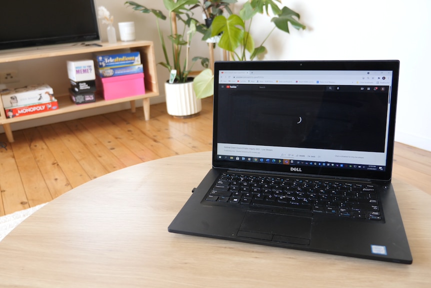 A laptop with a black screen