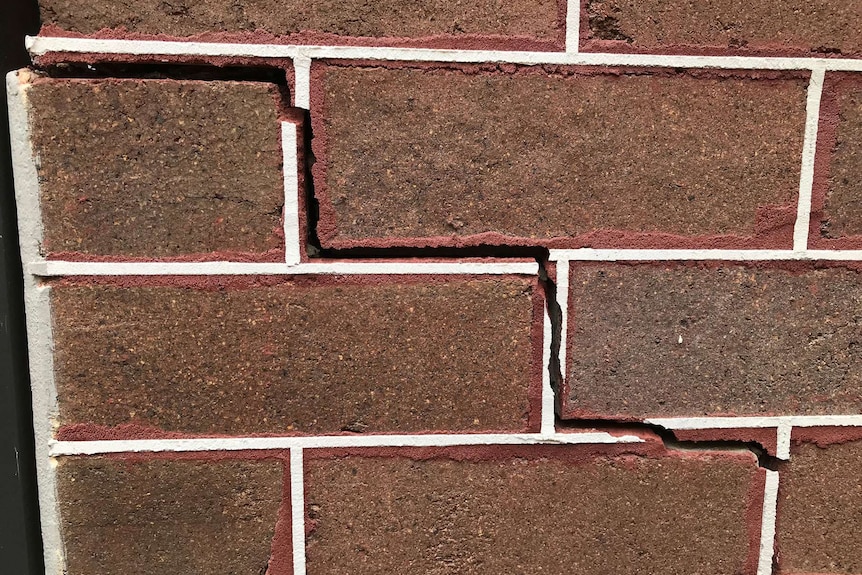 A jagged crack winds its way along the external brickwork of this hundred-year-old house in north-west Sydney.