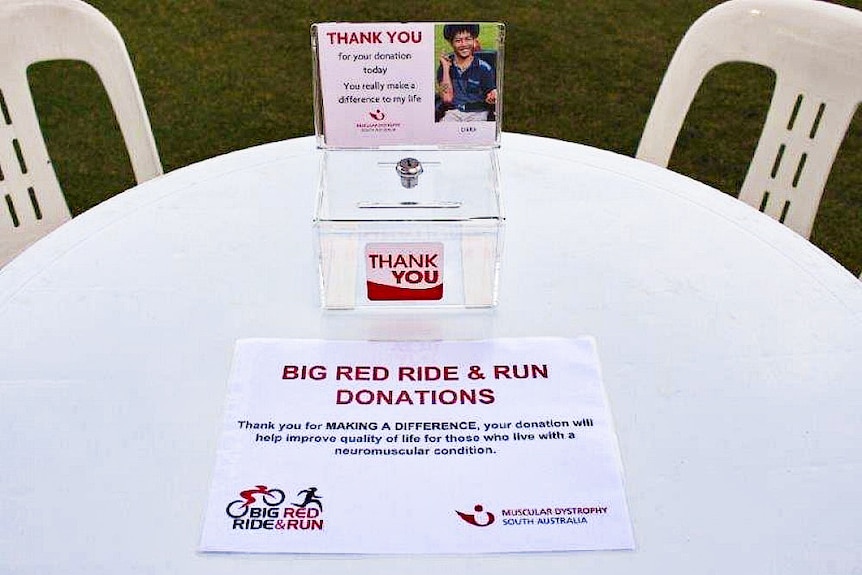 A donation box on an outdoor table