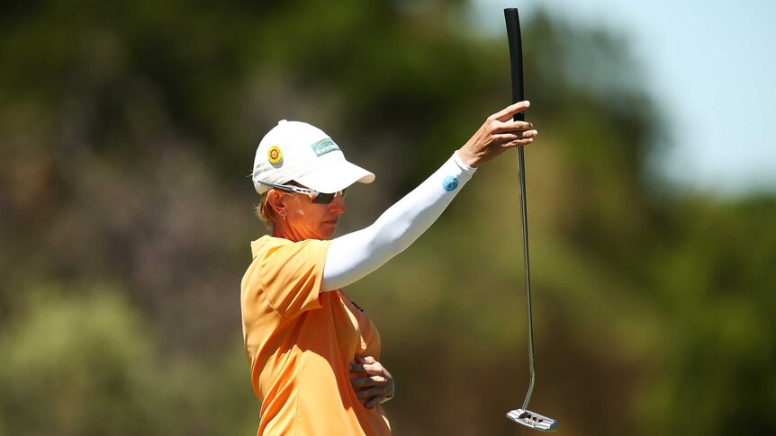 Karrie Webb lines up a shot on day one of the Women's Australian Open