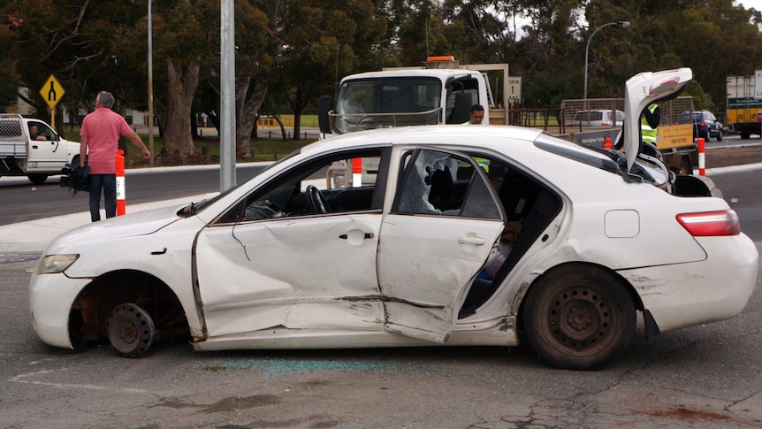 Smashed up white Camry involved in police chase in Perth by prison escapee Danny Jay Brooks 15 September 2016