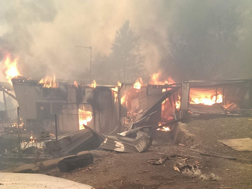 Greg Webb's home on fire on New Years Eve last year.