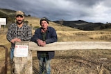 Two farmers Swifts Creek farmers Scott McCole and Ron Shelton at a gate post