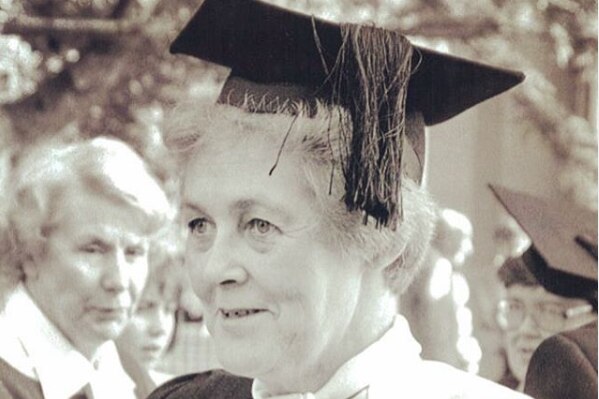 Ann Shorten wears a graduates hat and academic attire