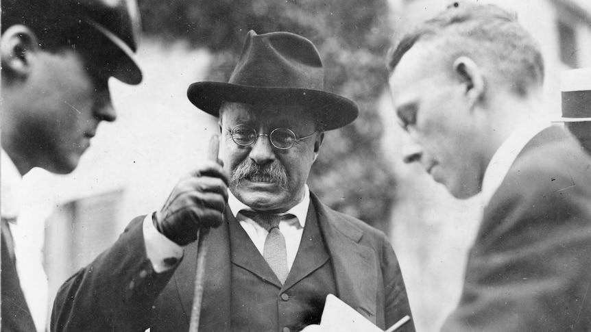 US President Theodore Roosevelt is interviewed by unidentified journalists, mid 1900s.