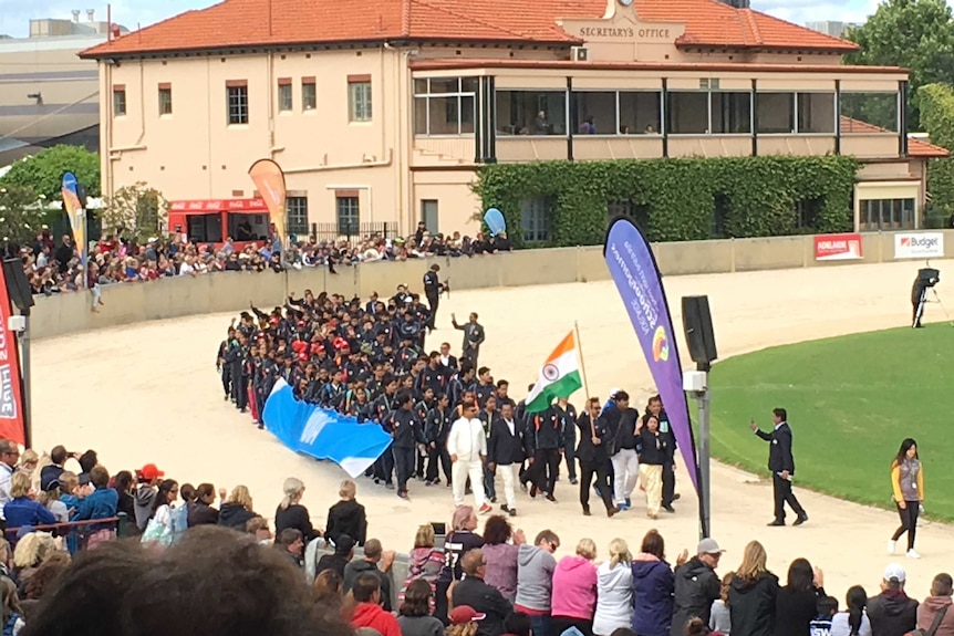 The Indian team enters the Adelaide Showground for the Pacific School Games.