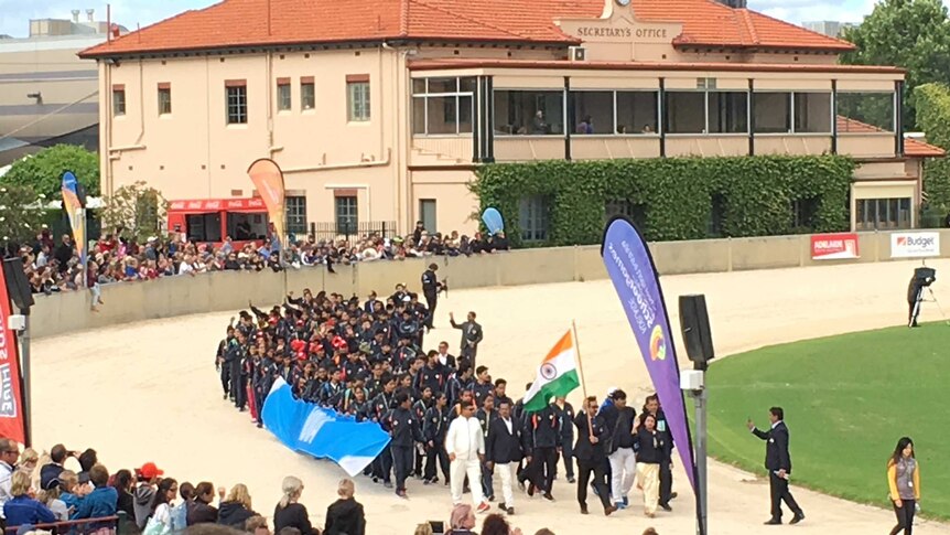 The Indian team enters the Adelaide Showground for the Pacific School Games.