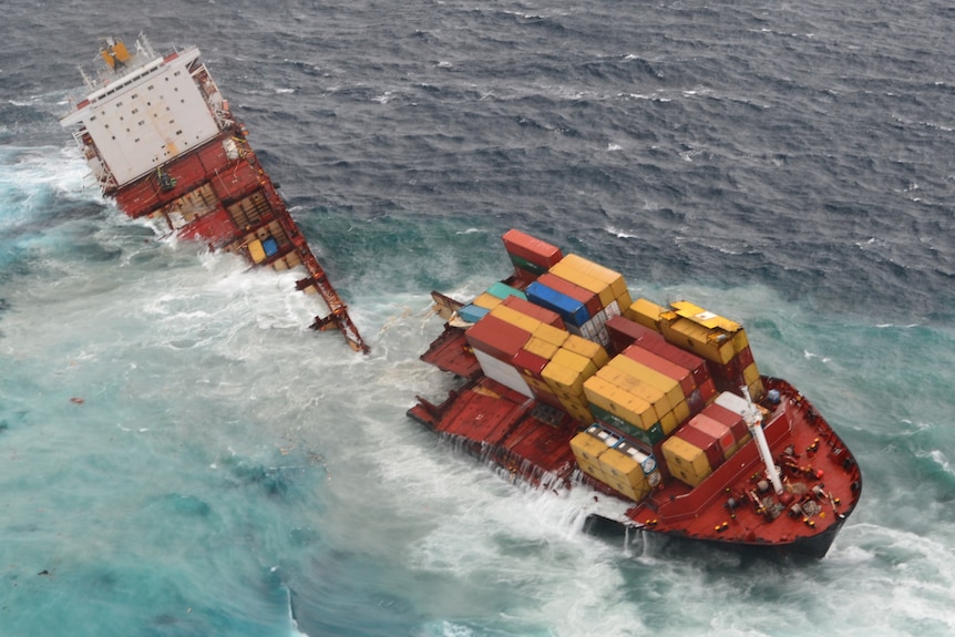 The Rena separates into two pieces after being battered by 6-metre waves.