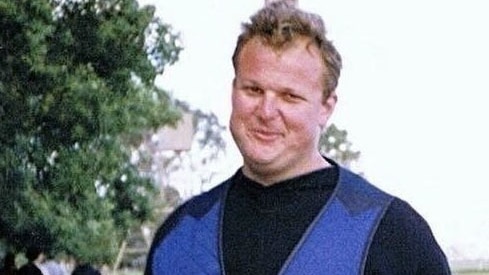 Shooting victim David Calandro wearing a blue vest.