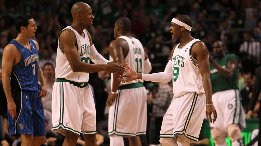 In control ... Ray Allen and Rajon Rondo celebrate a play