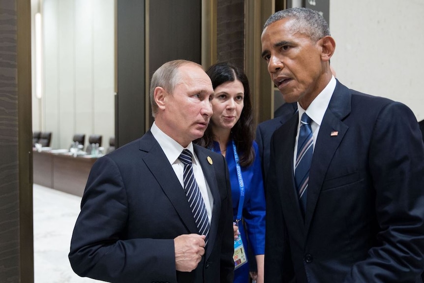 President Obama talks with President Vladimir Putin of Russia