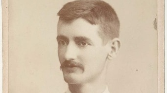 Sepia portrait of a young Henry Lawson.