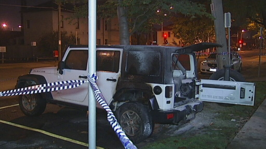 Officer's car set on fire outside Footscray police station - ABC News