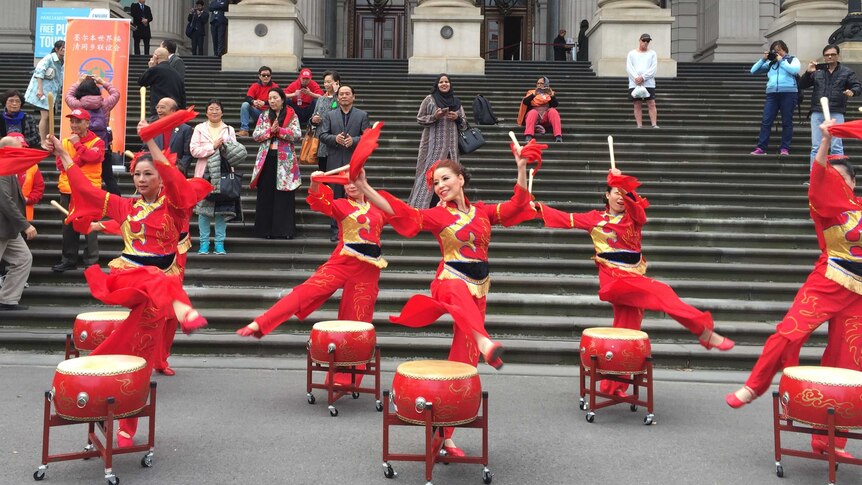 The walkers were greeted by Chinese dancers on the steps of Victoria's Parliament.
