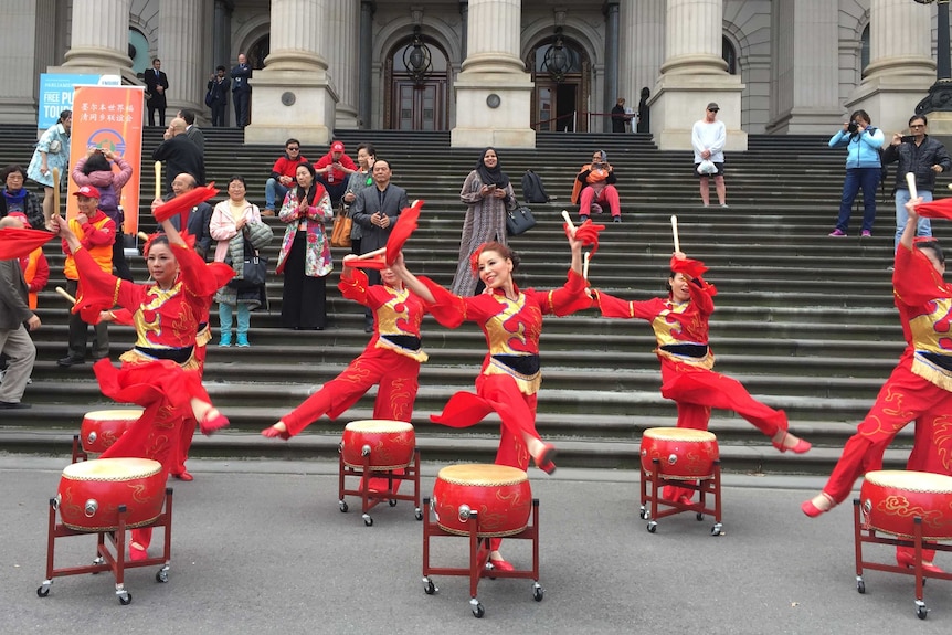 The walkers were greeted by Chinese dancers on the steps of Victoria's Parliament.