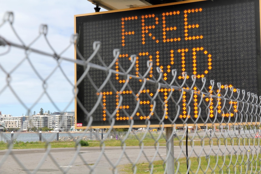 An electronic sign saying Free COVID testing