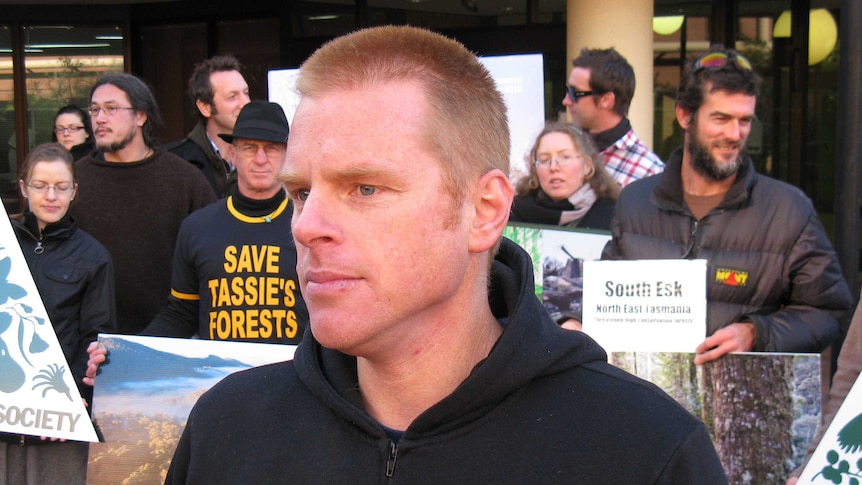 The Wilderness Society's Vica Bayley stands in front of an anti-logging protest.