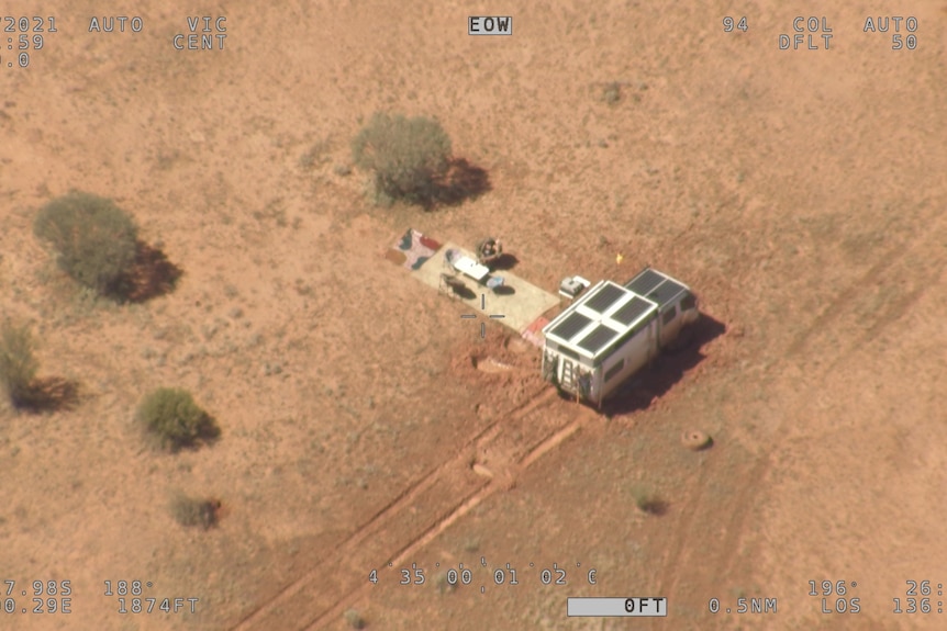 A campervan stranded in the SA outback following heavy rains.