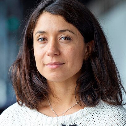 Headshot of a woman in her 40s, the director Imara Savage