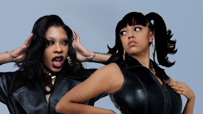 Rico Nasty (dressed in black leather coat) and Mahalia (dressed in black leather top)