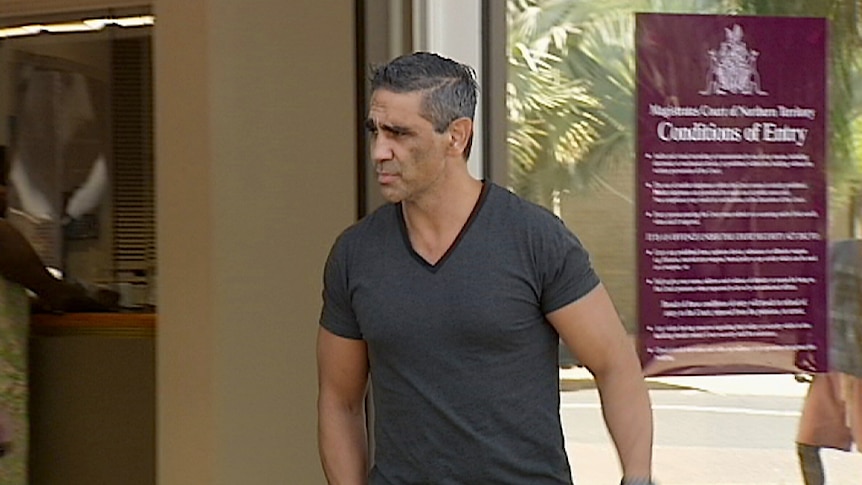 Former Geelong Cats star Ronnie Burns leaves Darwin Magistrates Court after a hearing on a domestic violence matter.