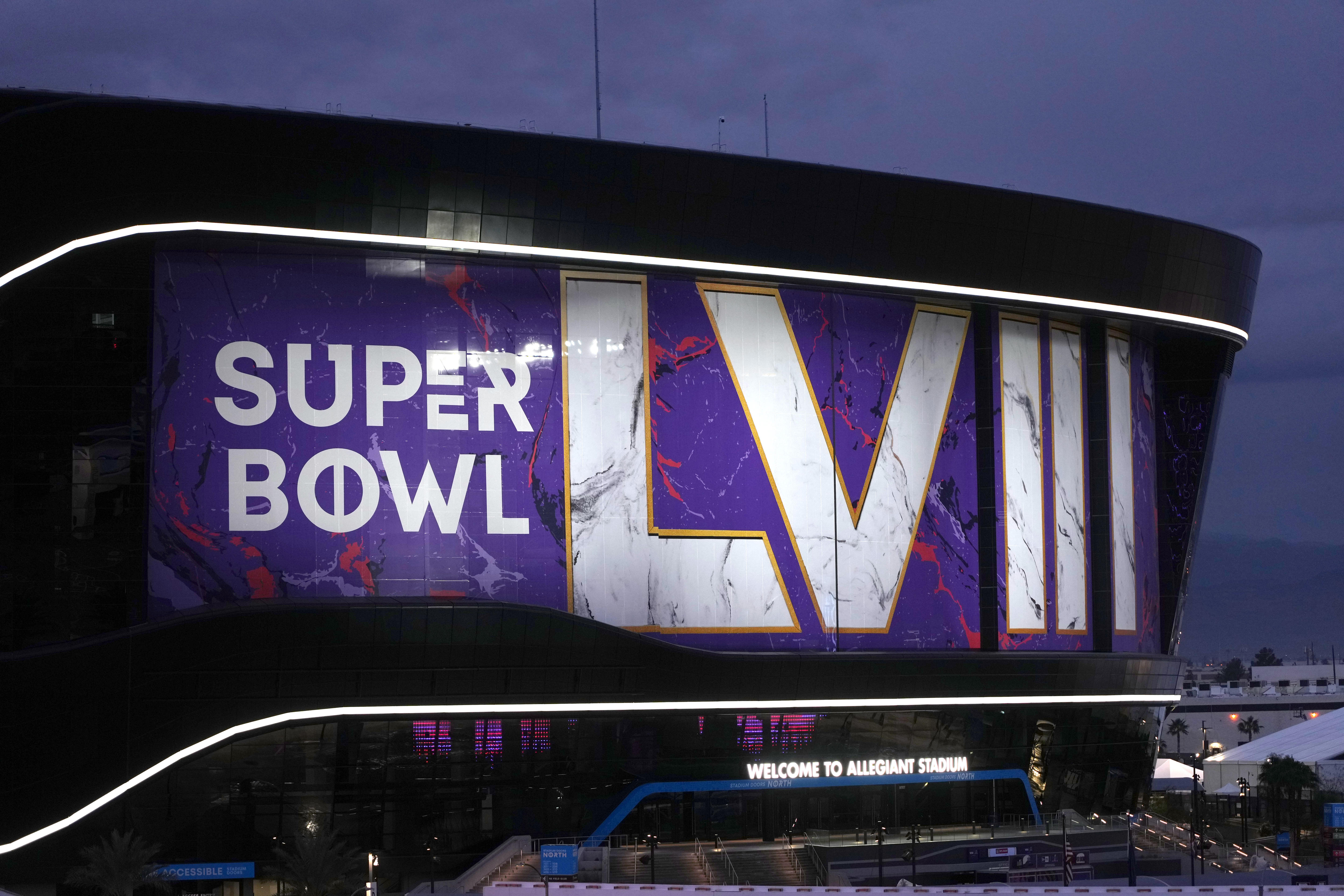 A general overall view of the Super Bowl 58 roman numerals logo on the Allegiant Stadium facade.