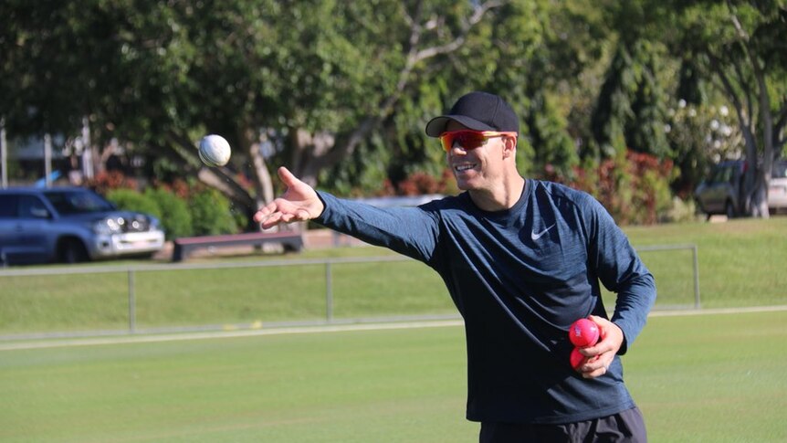 David Warner throws a ball in Darwin