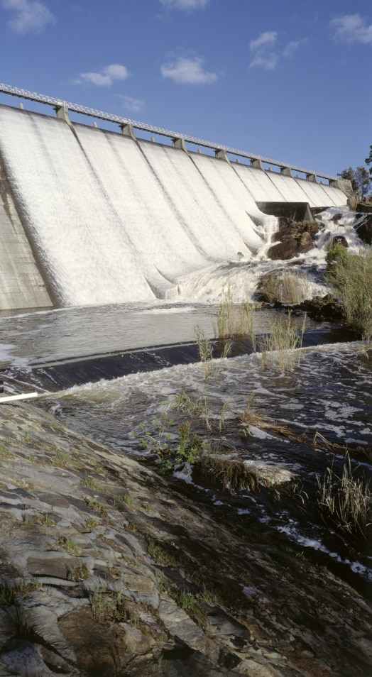 Water tumbling down dam wall