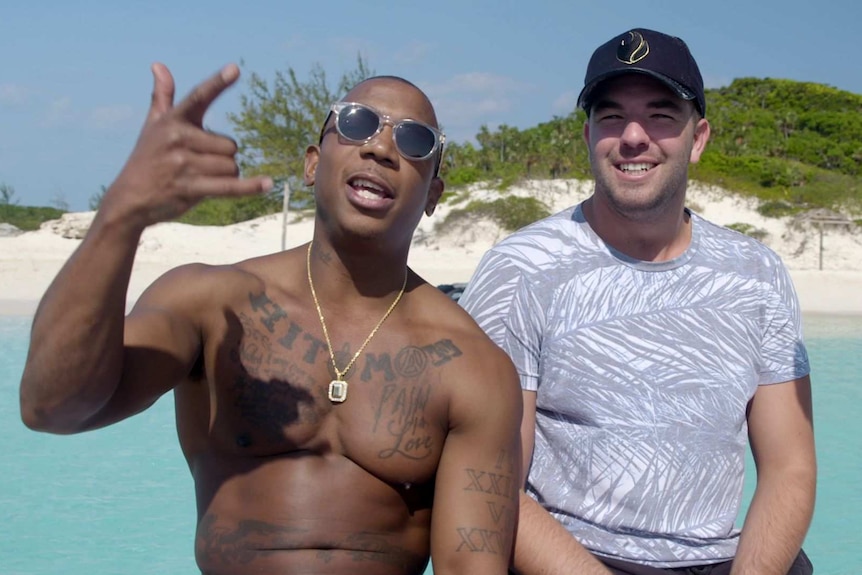 Rapper Ja Rule and entrepreneur Billy McFarland promote Fyre Festival in the Bahamas.