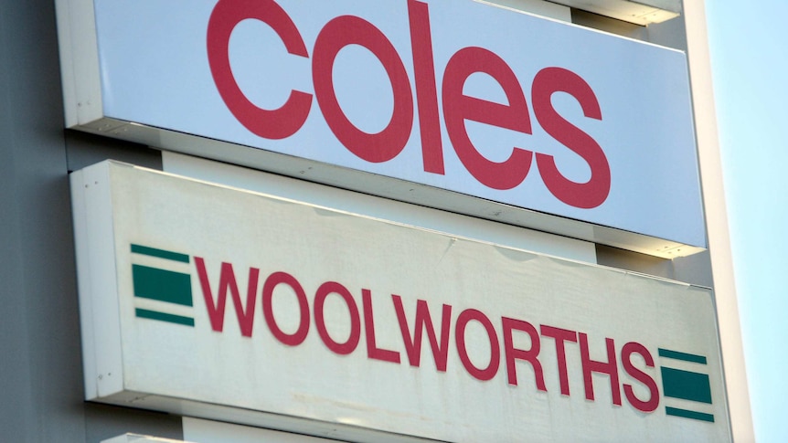 Coles and Woolworths supermarket signs in Brisbane