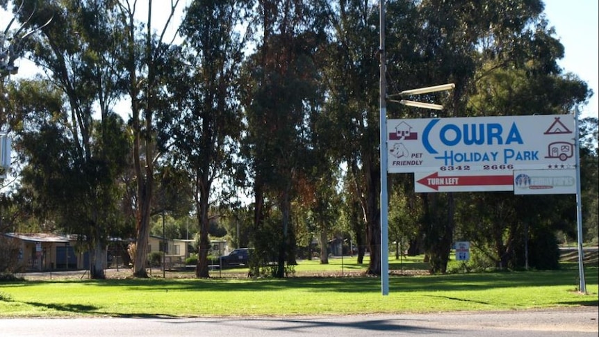 Sunny day with the Holiday Park sign.