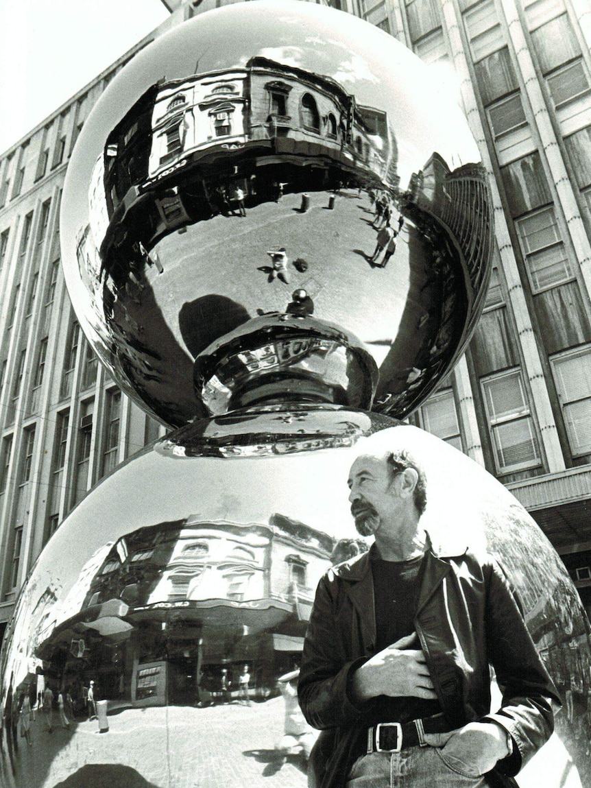 Bert Flugelman reflected in the famous balls he designed