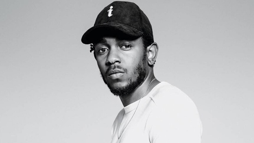 A 2015 black and white photo of Kendrick Lamar