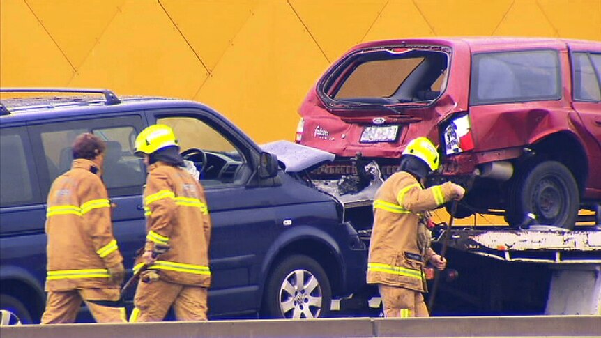 Two cars about to be towed away after a multi-car crash on the West Gate Freeway on June 1, 2014.