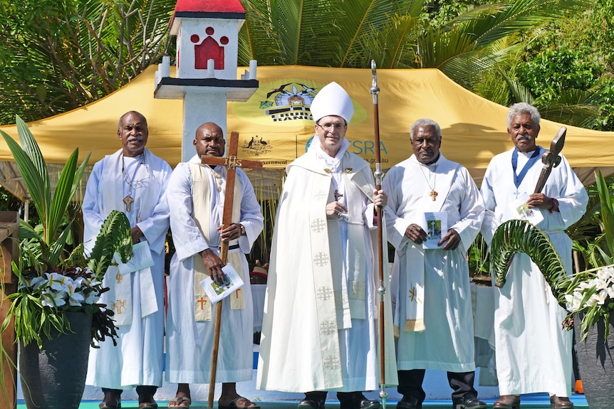 A group of men wearing religious robes.
