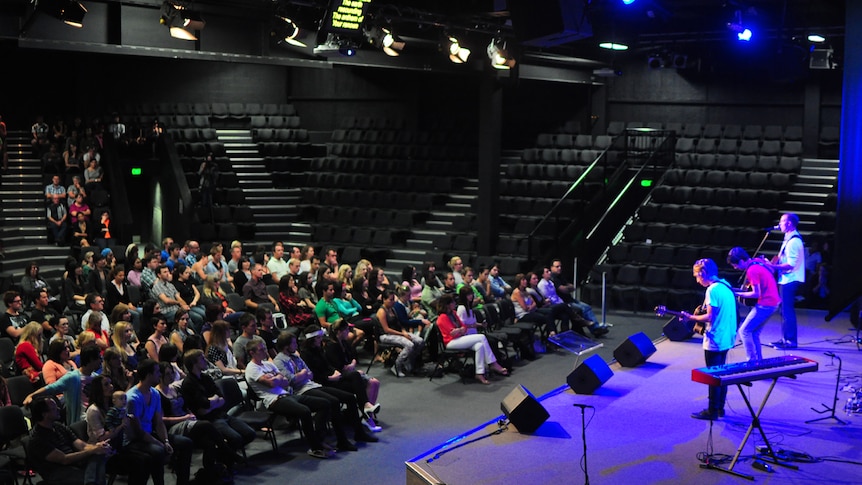 Church members gather for a Sunday night service at Brisbane City Church in April, 2011.