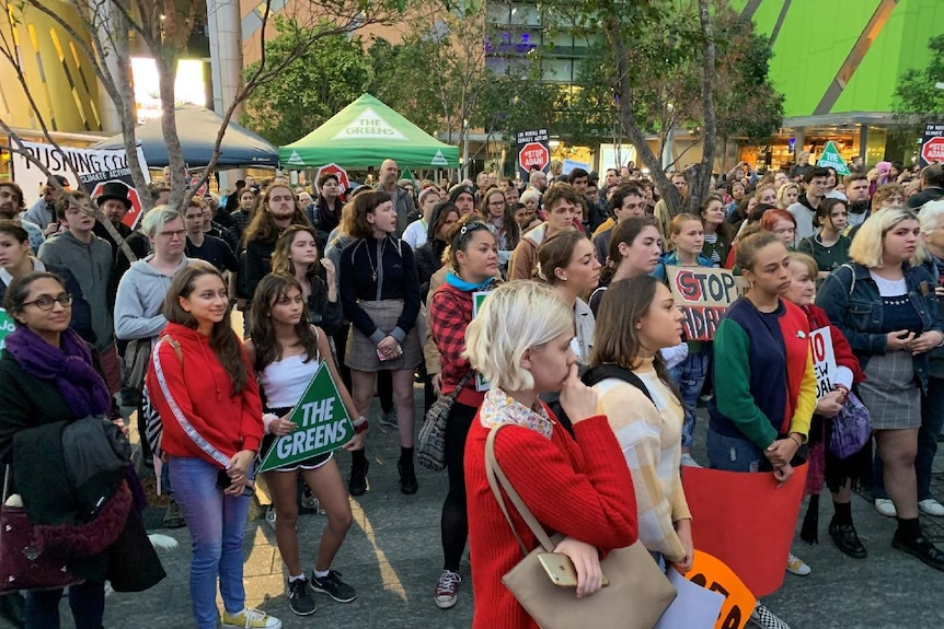 Hundreds of people have gathered in Brisbane Square in the city's CBD to oppose the approval of Adani's Carmichael mine.