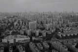 A black and white drone shot of Shanghai. 