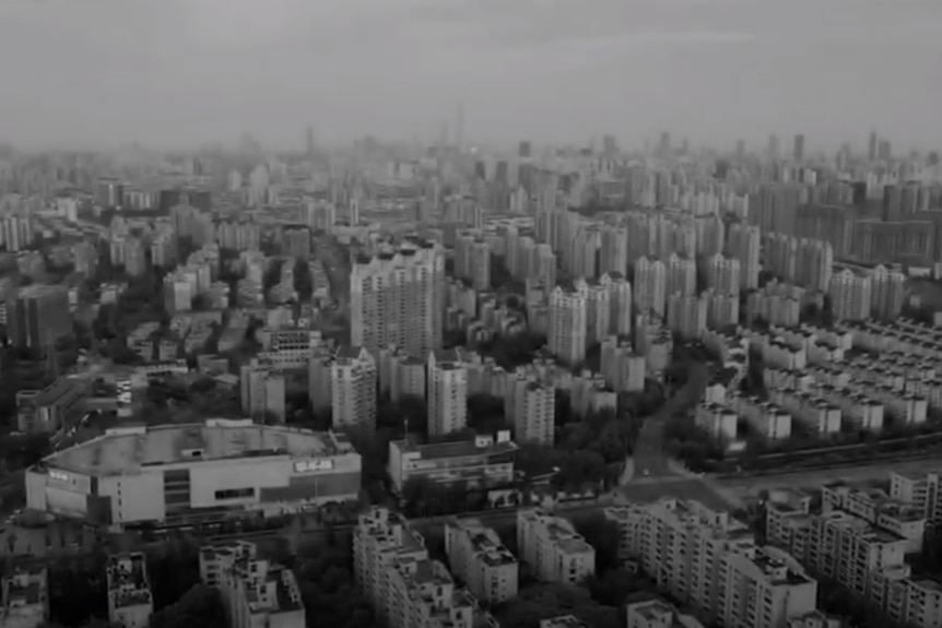 A black and white drone shot of Shanghai. 