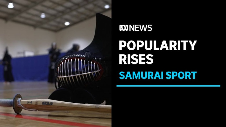 Popularity Rises, Samuri Sport: Samuri mask and practice sword rest on gymnasium floor.