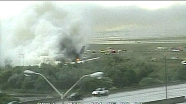 An Air France Airbus bursts into flames after skidding off a runway in Toronto, Canada.