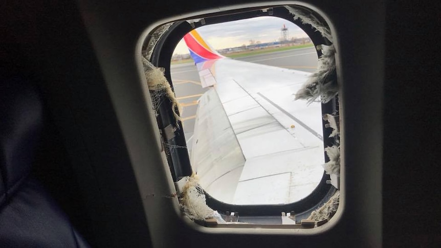 A window is blown on Southwest Airlines