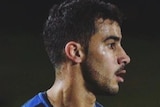 Hakeem AlAraibi on the football field.