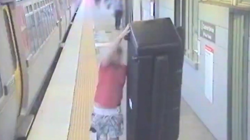 Queensland Rail security video shows people trying to move furniture on the trains