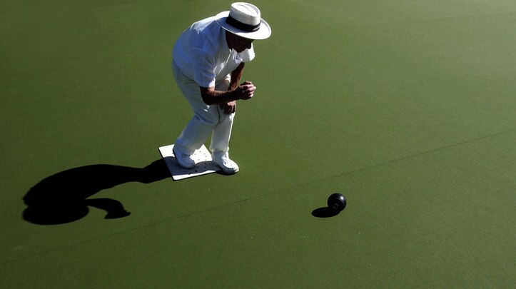Martin Gelberg of the Armadale Bowling Club bowls during competition at the club.
