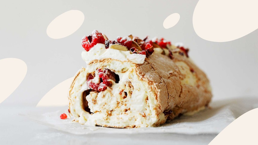 Photograph of a rolled meringue with cream and berries, in a collect of best main, salad and dessert recipes to make this summe.