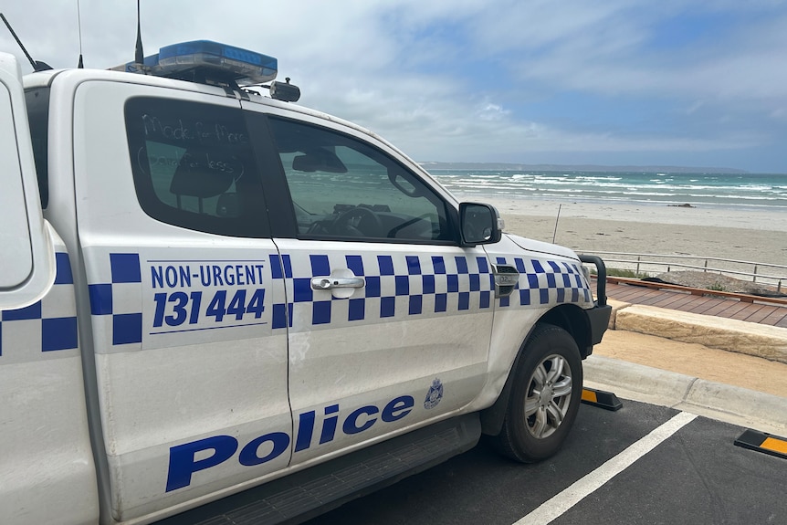 Police car parked at beach at Cape Bridgewater in Victoria.