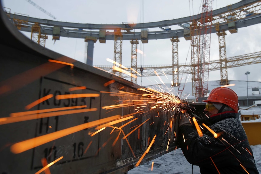 A worker at the Yekaterinburg Arena in Russia.